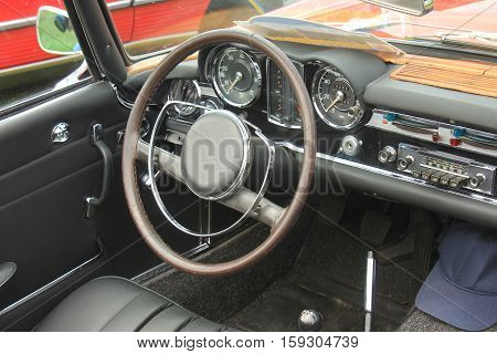 a Dashboard of a vintage sports car