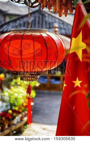 The Flag Of China And Traditional Chinese Red Lantern