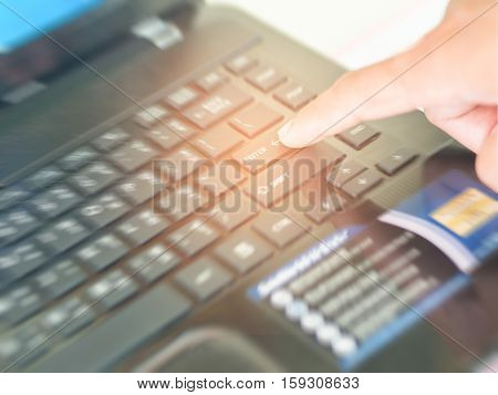 Forefinger Pressing Enter Button On Your Keyboard. Start Work Concept.