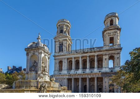 Church Saint-Sulpice is a Roman Catholic church in Paris France. View of facade with fountain
