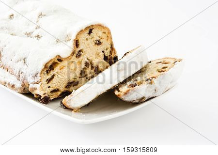 Christmas stollen. Traditional German Christmas dessert. isolated on white background