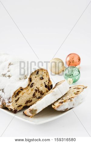 Christmas stollen. Traditional German Christmas dessert. isolated on white background