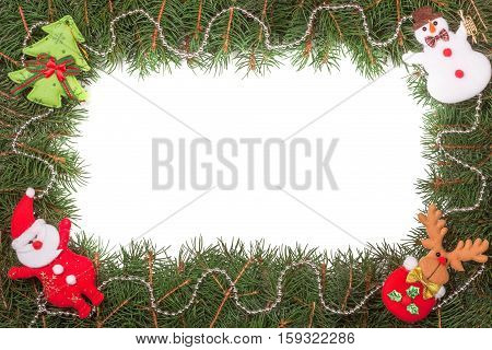 Christmas frame made of fir branches decorated with Santa Claus and snowman isolated on white background.
