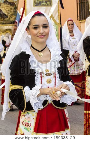 CAGLIARI, ITALY - May 1, 2016: 360th Sant'Efisio Festival - Sardinia - portrait of a beautiful girl in traditional Sardinian costume