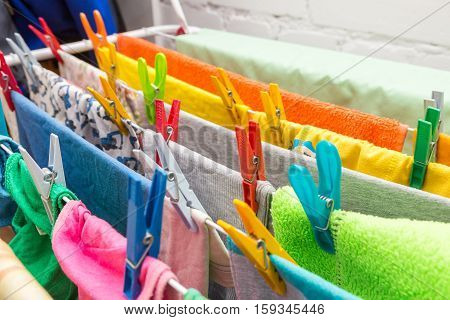 Close Up Clothes Dryer And Plastic Clips
