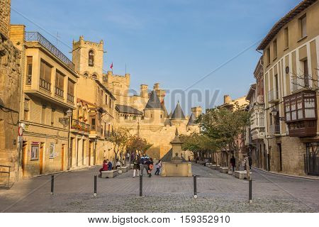 OLITE, SPAIN - NOVEMBER 1, 2016: People at the central square of Olite, Spain