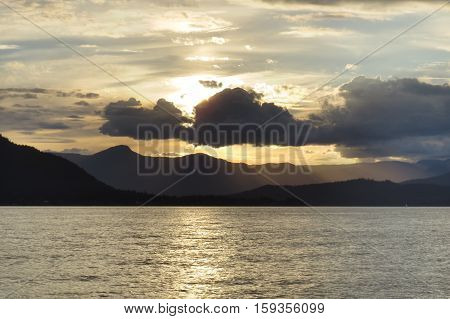 Vibrant sunset with beams of light, Vancouver, Canada.