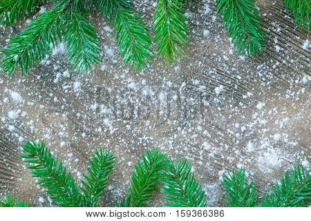 Christmas Tree Green Branches On Winter Snowbound Wooden Background