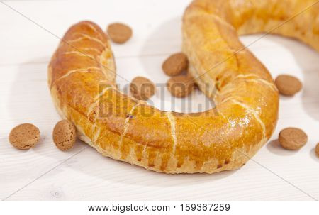 Traditional Dutch cookie Banketletter at Sinterklaas celebration on wooden background