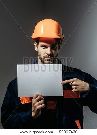 Serious Man Keeps Blank Paper