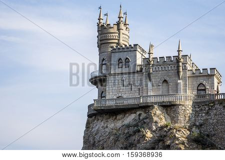 The decorative Neo-Gothic castle Swallow's Nest on the rock over the Black Sea. Gaspra. Crimea
