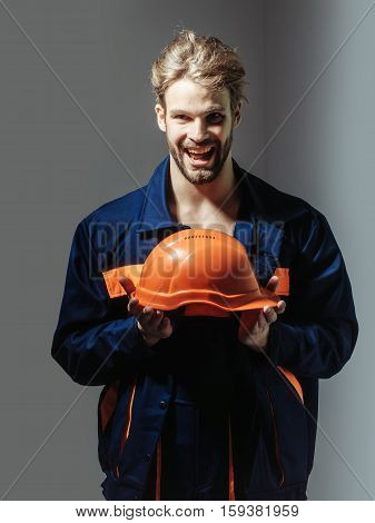 Excited Man Keeps Hard Hat