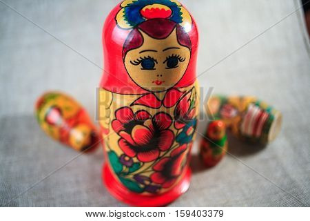 Russian dolls. Matryoshka on linen fabric for the background.