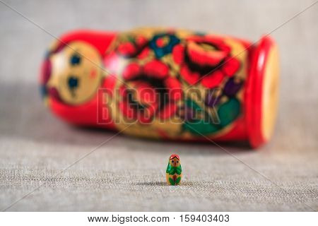 Russian dolls. Matryoshka on linen fabric for the background.