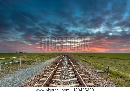 Endless Railroad In Open Rural Countryside