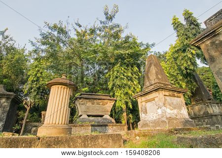 KOLKATA WEST BENGAL INDIA - NOVEMBER 2ND 2014 : Old cemetery at south Park Street Kolkata. It is one of the earliest non-church cemetaries in the world heritage site of Kolkata earlier Calcutta