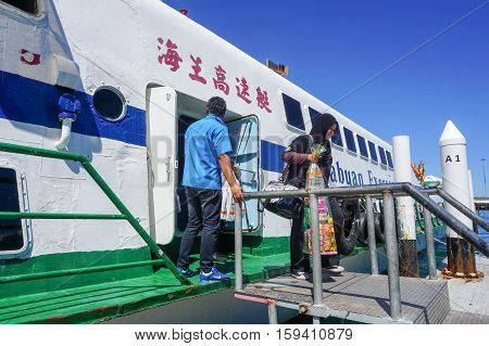 Kota Kinabalu,Sabah-Nov 28,2016:Passengers express ferry arrived from Labuan island in Jesselton terminal,Kota Kinabalu,Sabah.Its a main tourist attraction & cheaper transportation to Labuan Island.