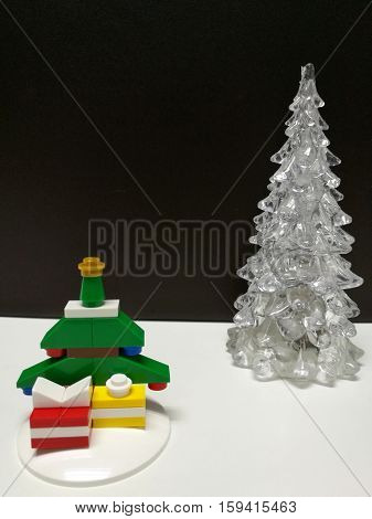 Merry Christmas and Happy New Year white clear and tiny colorful Xmas tree toy decoration