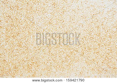 Brown rusty zinc texture background. Old zinc dot pattern vintage style. Surface yellow steel wall weathered. Pattern of decorative red dot painted.