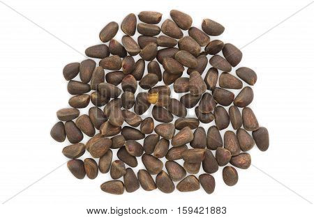 Unpeeled cedar nuts isolated on white background. Clipping path included.