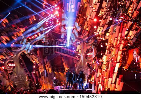 POLAND KRAKOW - JANUARY 01 2015: Celebrating the New Year 2015. People watch the festive show on the Main Market Square in historical center of Krakow.