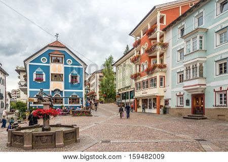 ORTISEI,ITALY - SEPTEMBER 16,2016 - In the streets of Ortisei. Ortisei is a town in South Tyrol in northern Italy. It occupies the Val Gardena within the Dolomites a mountain chain that is part of the Alps.