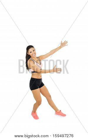 young beautiful latin woman in fitness clothes dancing in aerobic workout happy and excited isolated on white background in healthy lifestyle and gym dancer instructor concept