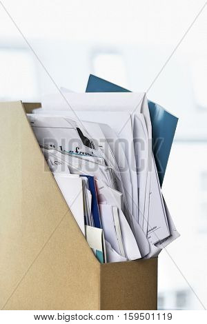 Closeup of box file crammed with papers