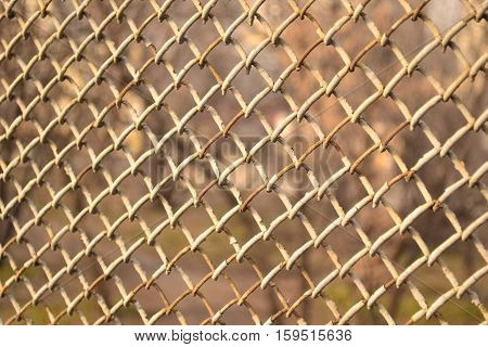 rusty Meshes over the railway in the city