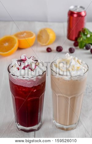 Milkshake shot close-up on a wooden background in the decoration