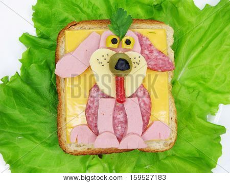 creative sandwich with cheese and salame dog shape