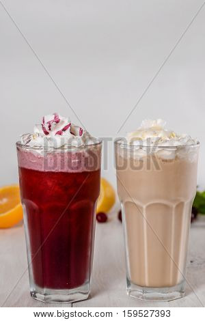 Milkshake shot close-up on a wooden background in the decoration