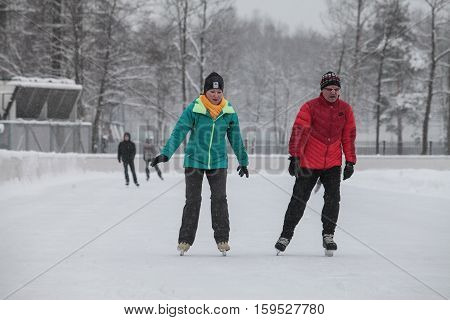 Saint-Petersburg Russia - December 2 2016: Urban outdoor ice rink in the park.