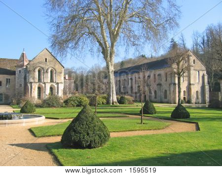 Church And Its Garden, Fonteney French Abbey, France
