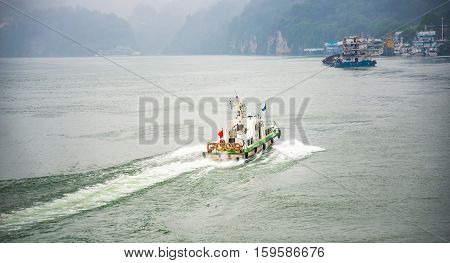 Speed boat sailing across Yangtze river, China
