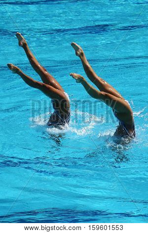 RIO DE JANEIRO, BRAZIL - AUGUST 15, 2016: Huang Xuechen and Sun Wenyan of team China compete during synchronized swimming duets free routine preliminary of the Rio 2016 Olympic Games