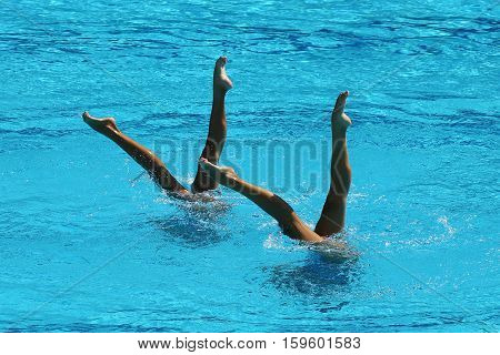 RIO DE JANEIRO, BRAZIL - AUGUST 15, 2016: Huang Xuechen and Sun Wenyan of team China compete during synchronized swimming duets free routine preliminary of the Rio 2016 Olympic Games
