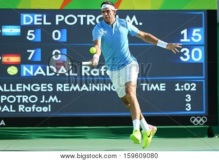 RIO DE JANEIRO, BRAZIL - AUGUST 13, 2016: Grand Slam champion Juan Martin Del Potro of Argentina in action during his semifinal match of the Rio 2016 Olympic Games at the Olympic Tennis Centre