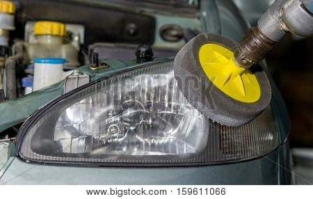 front headlight polishing renewed plastic headlamp closeup
