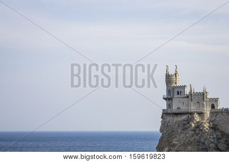 The decorative Neo-Gothic castle Swallow's Nest on the rock over the Black Sea. Gaspra. Crimea