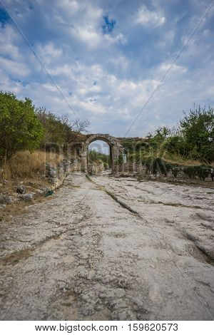 Ruins of medieval cave town Chufut-Kale, gate Orta-Kapu, Bakhchisaray, Crimea