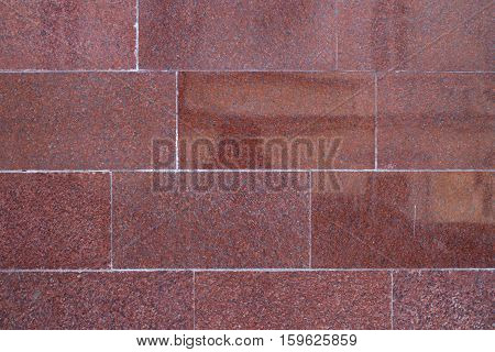 Tile smooth red marble background in the daytime