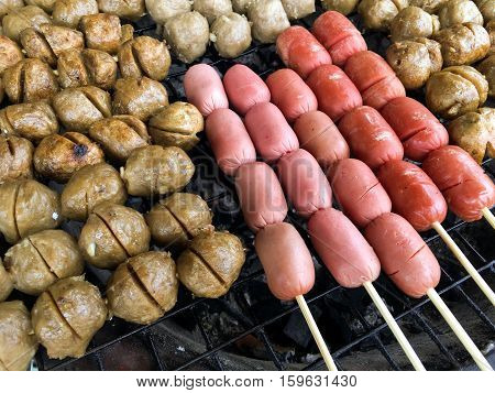 close up hot grilled meatball on stove