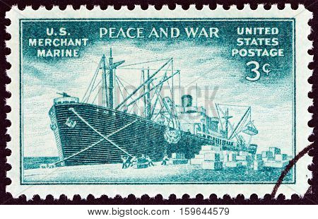 USA - CIRCA 1946: A stamp printed in USA shows Liberty type freighter unloading cargo, circa 1946.