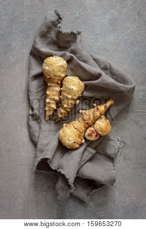 Sunchoke raw roots ready to be cooked view from above flat lay