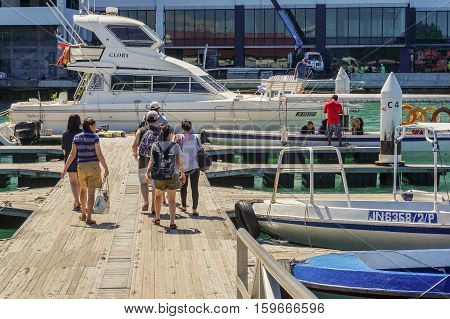 Kota Kinabalu,Sabah-Nov 28,2016::Tourists on the speedboat at Jetty Jesselton Point,Kota Kinabalu,Sabah.The jetty provided tourists facilities to the famous islands in Tunku Abdul Rahman Marine Park.