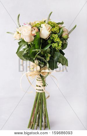 Bouquet of cream roses. Still life with colorful flowers. Fresh roses. Place for text. Flower concept. Fresh spring bouquet. Summer Background. Copyspace