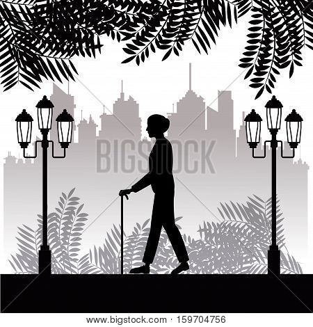 silhouette elder man walk stick park twon background