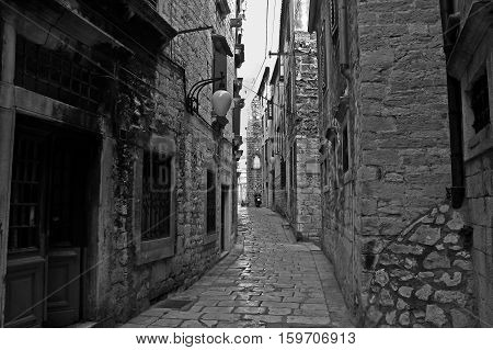 Sibenik / Tourist city by the Adratic sea - Sibenik, Croatia. The old stones, narrow street and stairs.