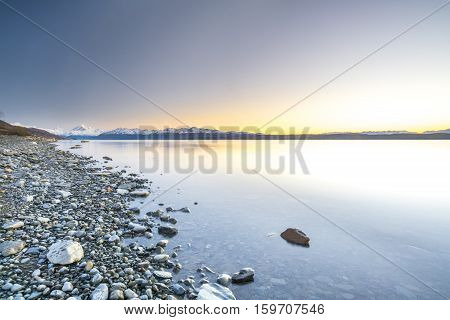 Lake stone and rock during sunrise moment